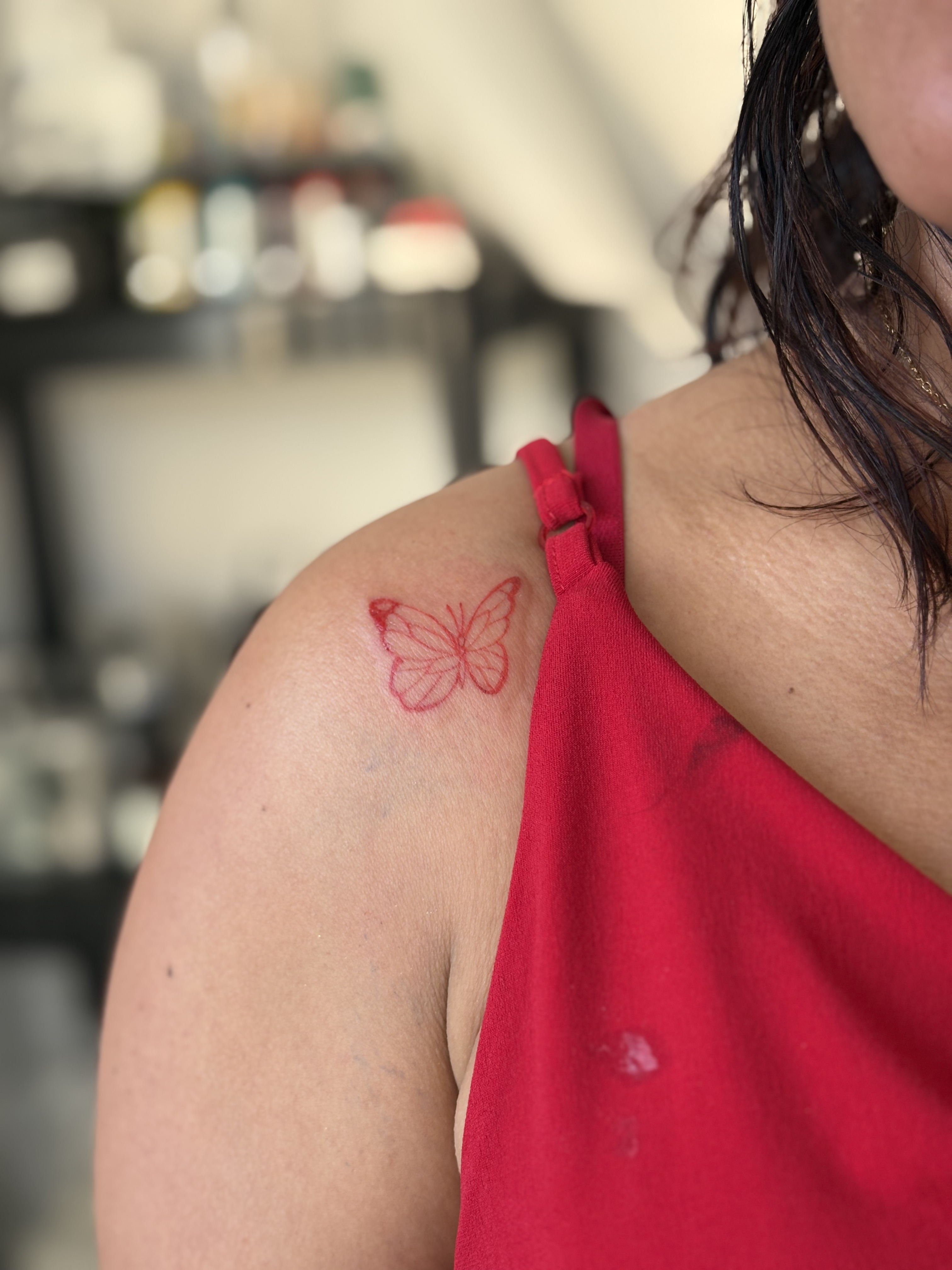 Tatuaje mariposa roja